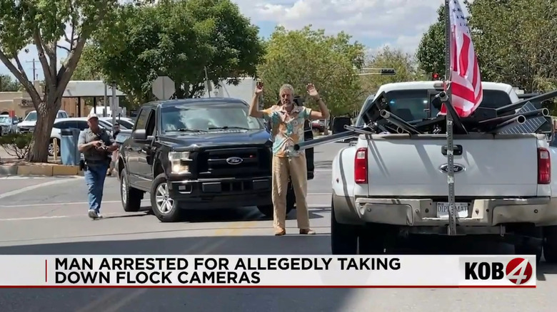 Jevon Martinez surrendering to Bernalillo County Sheriff's deputies with a truck bed full of Flock cameras