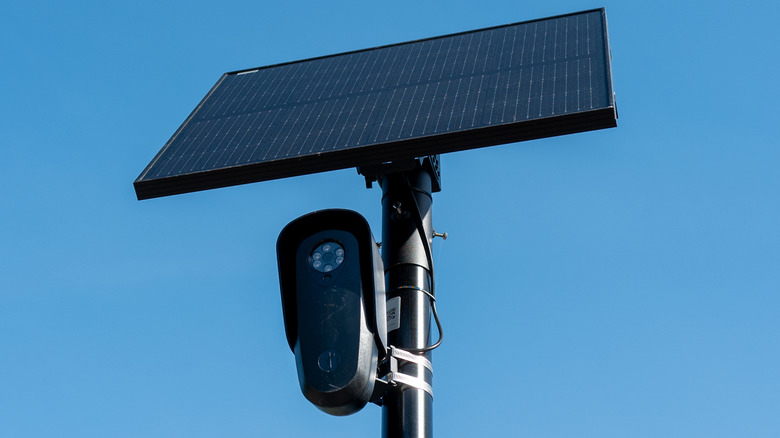 Flock license plate reader and camera with solar panel against a blue sky, Pleasant Hill, California, April 16, 2026.