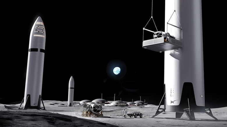 Artist's rendering of multiple Starship lunar landers near a lunar colony