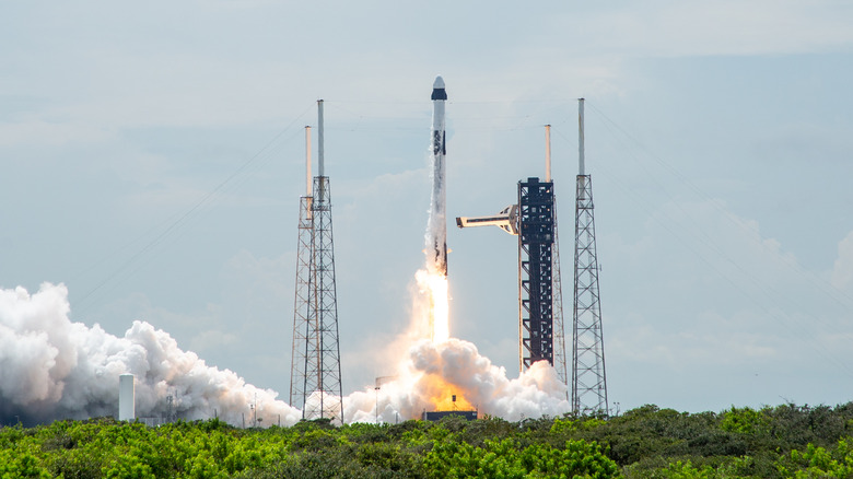 A SpaceX Falcon 9, carrying the Crew-9 astronauts to the ISS, achieves liftoff