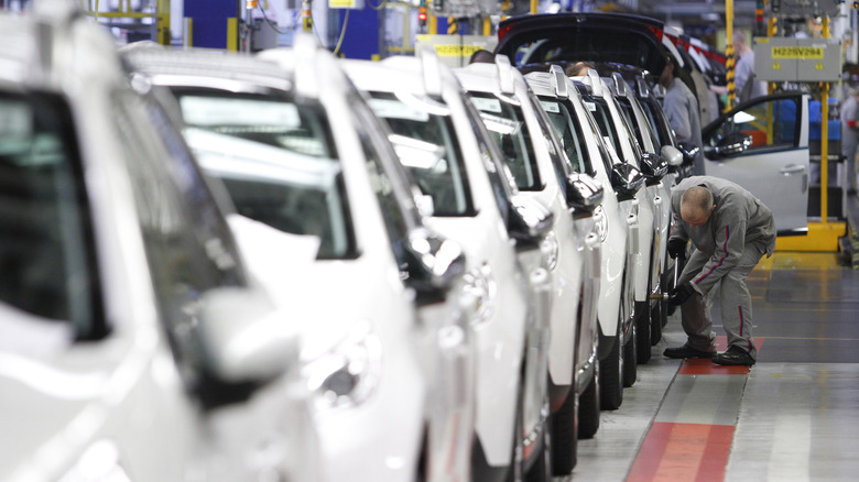 MULHOUSE, FRANCE - MARCH 14: Workers assemble Peugeot 2008 SUVs at the PSA Peugeot Citroen assembly plant on March 14, 2014 in Mulhouse, France. Chinese automaker Dongfeng is scheduled to soon sign a deal to take a 14% stake in the French carmaker, which is Europe's second largest and has suffered in recent years due to falling demand. Photo: Michele Tantussi / Getty Images