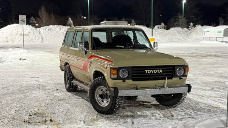 A tan Toyota Land Cruiser