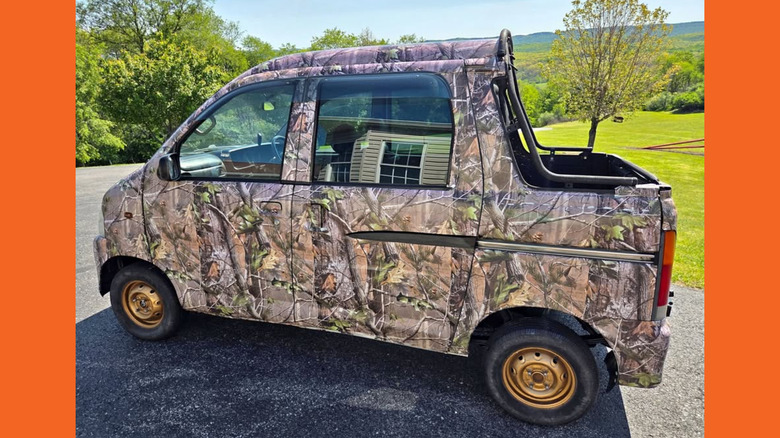 A RealTree camo Daihatsu Hijet Deckvan