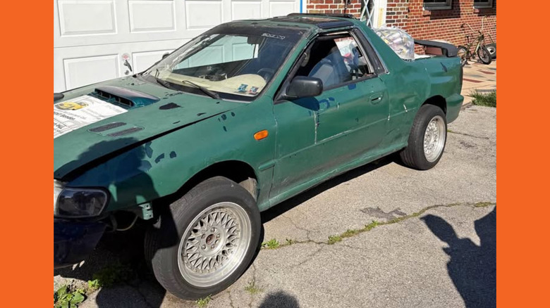 A green Subaru Impreza pickup