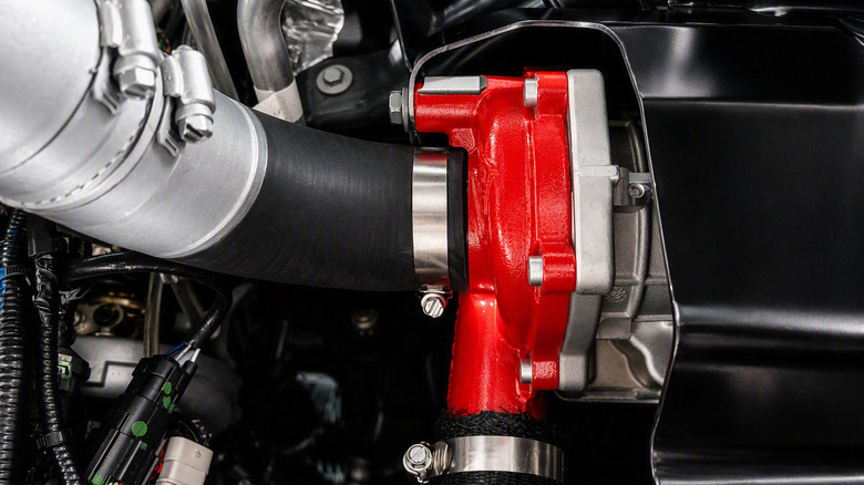 The e-compressor bolted on to a Hurricane I6 engine.