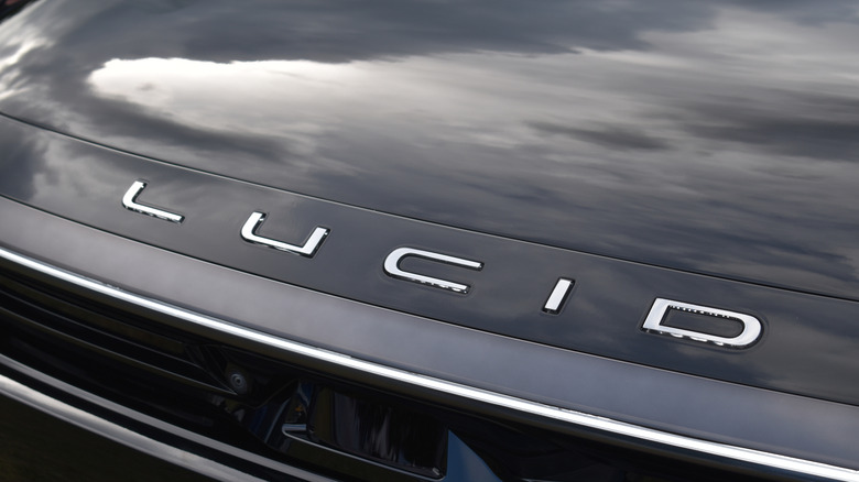 Beesd, the Netherlands - September 12, 2025: close up shot, the Lucid emblem of a black Lucid Gravity