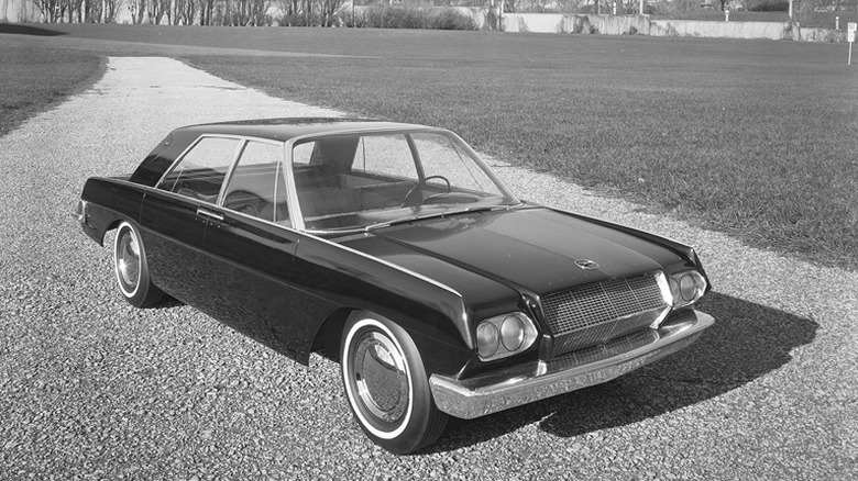 A prototype of the Studebaker Lark on a gravel park road