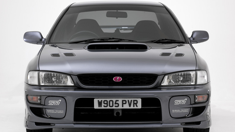 2000 Subaru Impreza with pink STI badge