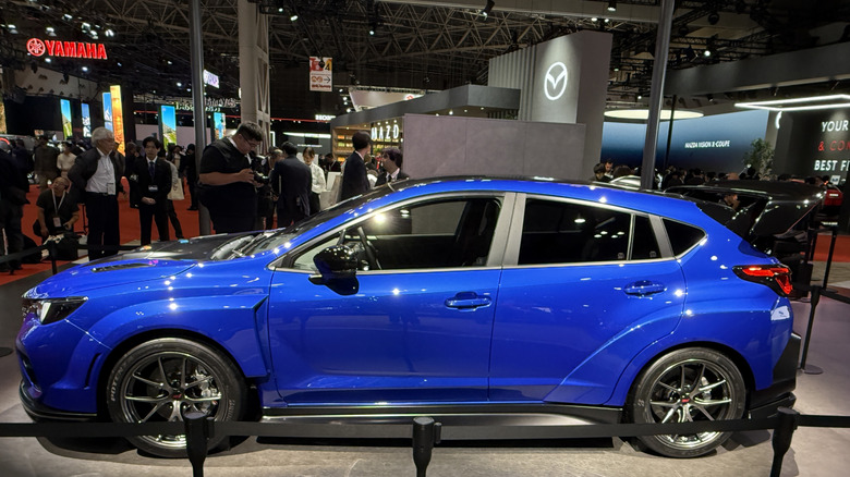A blue Subaru WRX STI hatchback concept