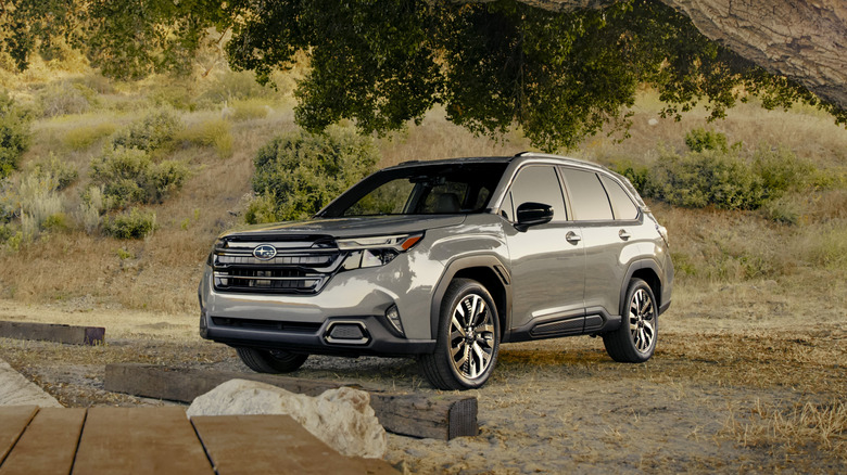 Front 3/4 view of a gray Subaru Forester.