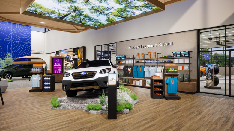 an inside view of theSubaru Connection Hub with a parked on a mini rock pile and clothing in the background