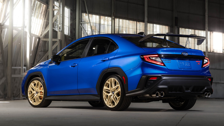 Rear 3/4 view of a blue Subaru WRX GD25