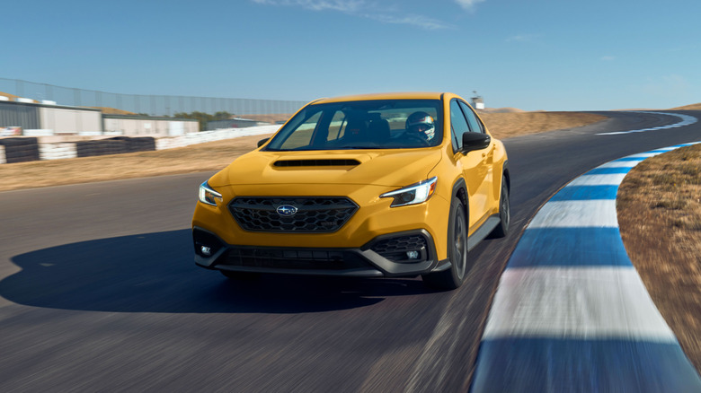2026 Subaru WRX Series.Yellow front view, driving on a race track