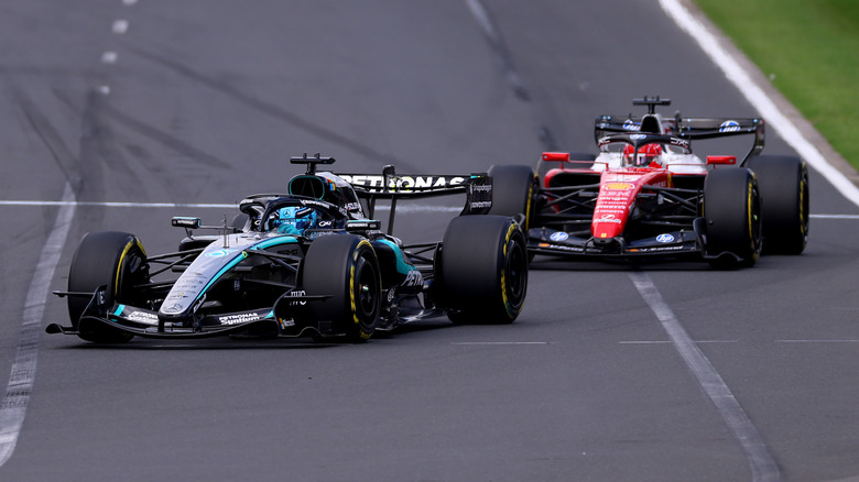 George Russell of Great Britain driving the (63) Mercedes AMG Petronas F1 Team W17 leads Charles Leclerc of Monaco driving the (16) Scuderia Ferrari SF-26 on track during the F1 Grand Prix of Australia at Albert Park Grand Prix Circuit on March 08, 2026 in Melbourne, Australia.