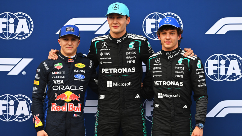 Pole position qualifier George Russell of Great Britain and Mercedes AMG Petronas F1 Team Second placed qualifier Andrea Kimi Antonelli of Italy and Mercedes AMG Petronas F1 Team and Third placed qualifier Isack Hadjar of France and Oracle Red Bull Racing look on during qualifying ahead of the F1 Grand Prix of Australia at Albert Park Grand Prix Circuit on March 07, 2026 in Melbourne, Australia.
