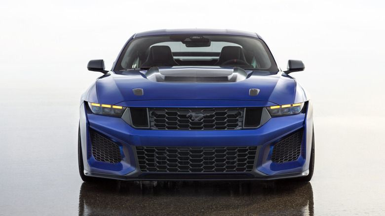 A blue Ford Mustang Dark Horse SC with track package