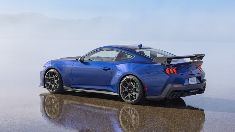 A blue Ford Mustang Dark Horse SC with track package