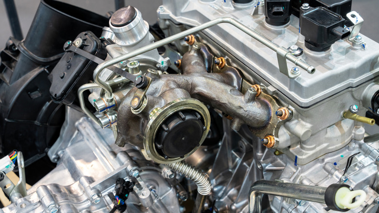 Closeup of a turbocharger attached on an engine
