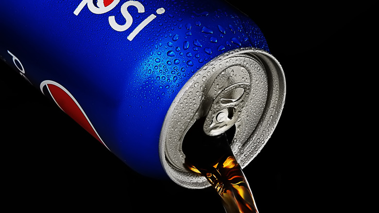 Cold Pepsi pouring from a can