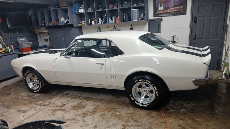 A white Pontiac Firebird