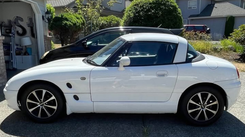 A white Suzuki Cappuccino