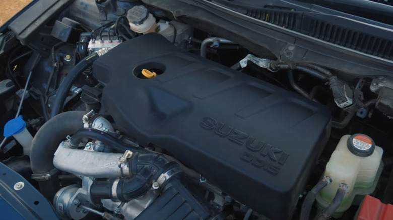 A Maruti Suzuki Ciaz engine bay with the engine on display