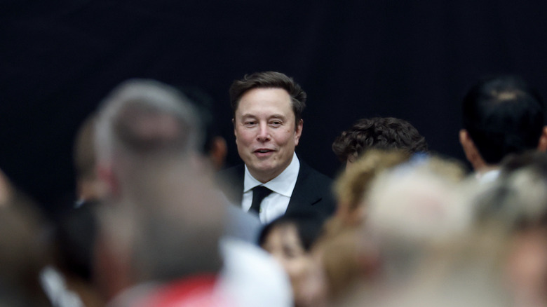 Tesla CEO Elon Musk attends the memorial service for political activist Charlie Kirk at State Farm Stadium on September 21, 2025 in Glendale, Arizona.