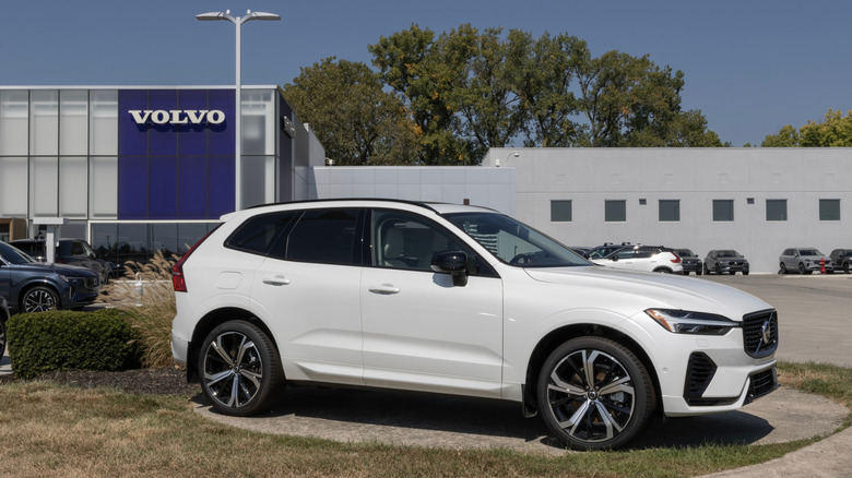 Indianapolis - September 14, 2025: Volvo XC60 T8 AWD Ultra PHEV SUV at a dealership. Volvo offers the XC60 with a 2.0L Turbo engine with hybrid motor. MY:2025