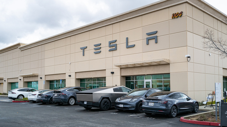 Rocklin, CA, U.S.A. - Feb. 13, 2025: Exterior entrance of a Tesla Service and repair center with cybertruck. Controversy arose this week over a possible government purchase of armored cybertrucks.