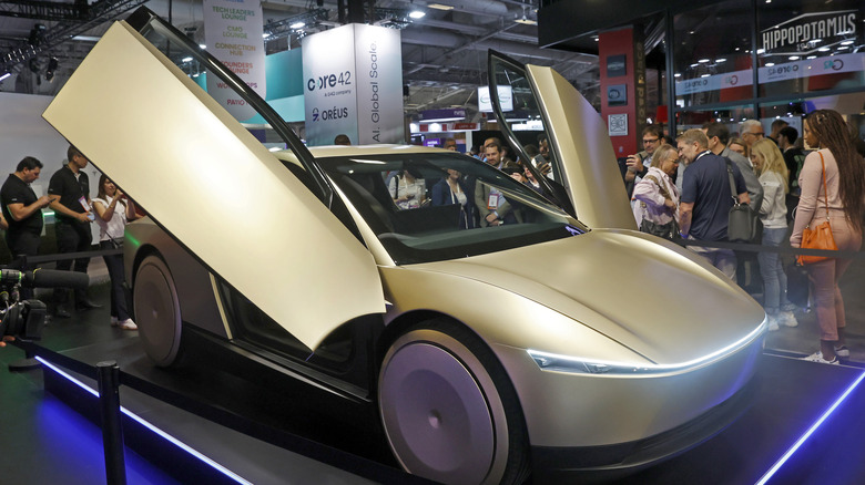 PARIS, FRANCE - JUNE 12: A Tesla Cybercab or Robotaxi two-passenger battery-electric self-driving car is displayed during the 9th edition of the VivaTech show at Parc des Expositions Porte de Versailles on June 12, 2025 in Paris, France. VivaTech, the biggest tech show in Europe but also in a unique digital format, for 4 days of reconnection and relaunch thanks to innovation. The event brings together startups, CEOs, investors, tech leaders and all of the digital transformation players who are shaping the future of the Internet. The annual technology conference, also known as VivaTech, was founded in 2016 by Publicis Groupe and Groupe Les Echos and is dedicated to promoting innovation and startups. (Photo by Chesnot/Getty Images)