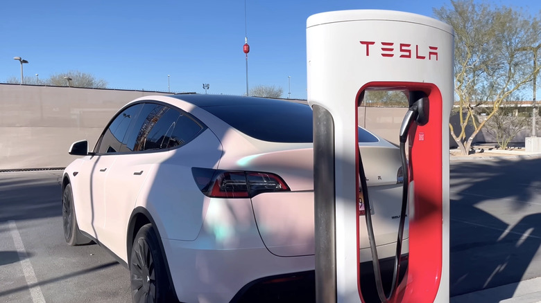 Image of a Tesla EV Car charging at a Tesla Supercharger Station. Photo taken in Las Vegas, USA, 20 June 2025.