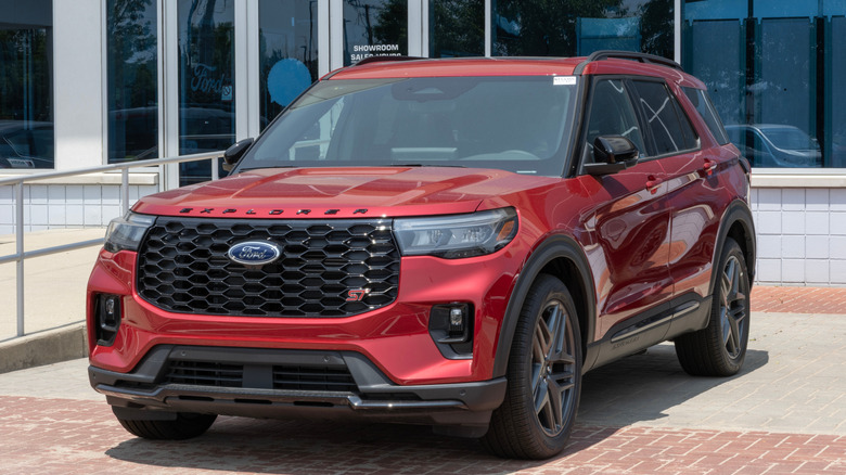 Ford Explorer ST AWD SUV display at a dealership.