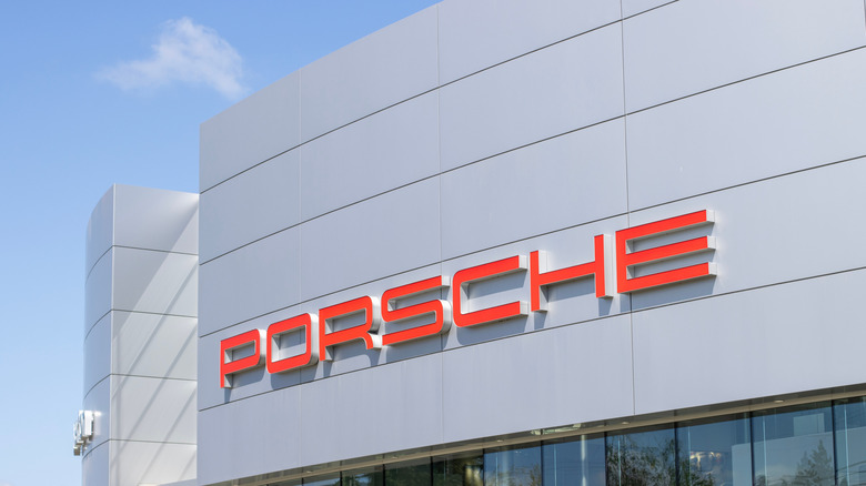 Beaverton, OR, USA - Apr 22, 2025: Exterior view of an authorized Porsche Center in Beaverton, Oregon. Porsche is a German automobile manufacturer specializing in luxury, high-performance sports cars.  by: Tada Images