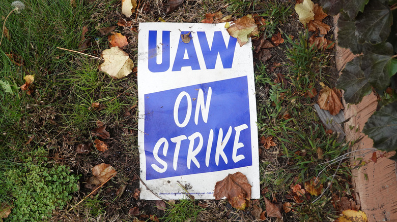 CHICAGO, ILLINOIS - OCTOBER 26: A strike sign lays in the grass outside of Ford's Chicago Assembly Plant on October 26, 2023 in Chicago, Illinois. Ford reached a tentative deal with the United Auto Workers (UAW) to settle their strike which began mid-September. Workers still have to vote to accept the terms of the agreement. (Photo by Scott Olson/Getty Images)