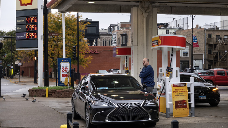A customer purchases fuel at a gas station on October 15, 2026 in Chicago, Illinois.