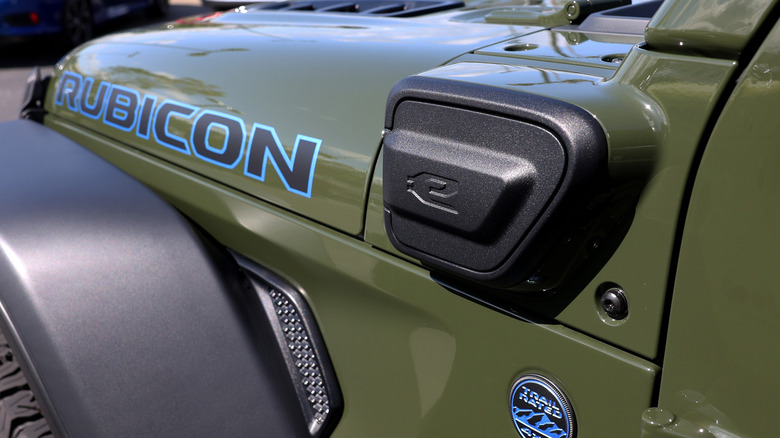 A view of a charging point on a Jeep Wrangler 4Xe plug-in hybrid that is displayed on the sales lot at Hilltop Chrysler Jeep Dodge Ram on April 05, 2024 in Richmond, California.