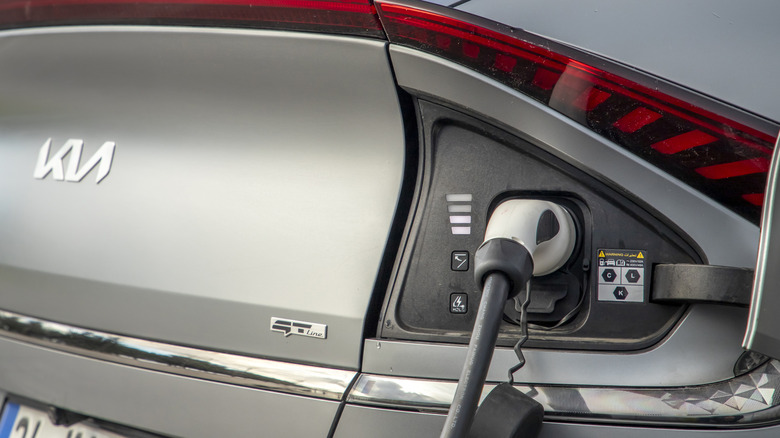 Istanbul, Turkey - January 16 2024 : Kia EV6 is a battery electric compact crossover SUV, is charging in the charging station.