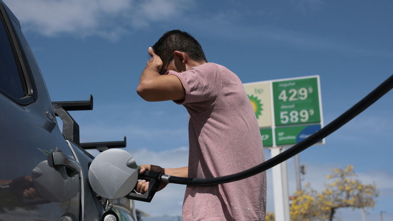 William Mao puts fuel in his vehicle at a gas station on April 06, 2026 in Miami, Florida.