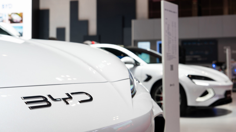 TOKYO, JAPAN - OCTOBER 30: Electric vehicles are displayed in the BYD booth during a media day for the Japan Mobility Show 2025 at Tokyo Big Sight in Tokyo, Japan on October 30, 2025. The show, formally known as the Tokyo Motor Show, will be open to the public from October 31