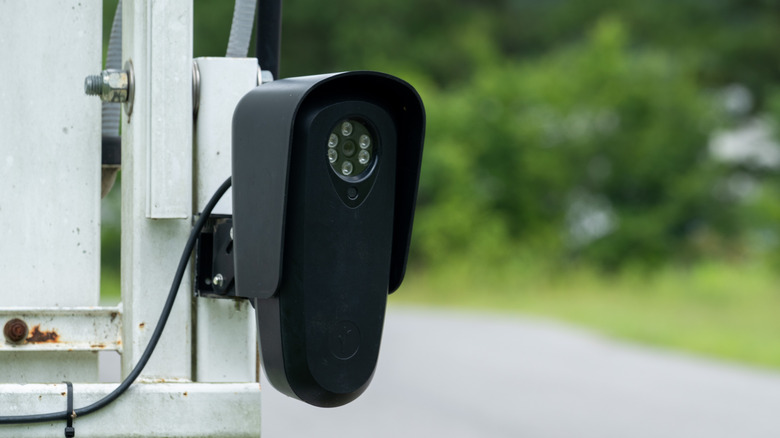 Flock security camera mounted on a speed-sensing trailer