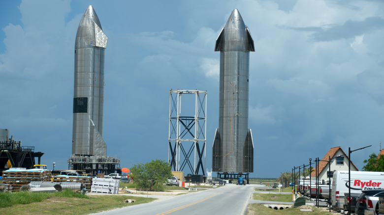 Starbase, Texas and surrounding buildings, with two Starship rockets in the background
