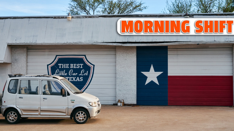 March 3rd 2017 - Dallas, Texas, USA: Straight on shot of a tiny car parked in front of an auto repair shop