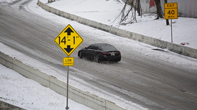 Vehicle on slushy, snowy road in Texas
