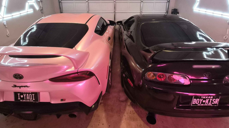 Two of Amber's cars, her A90 Supra and A80 Supra