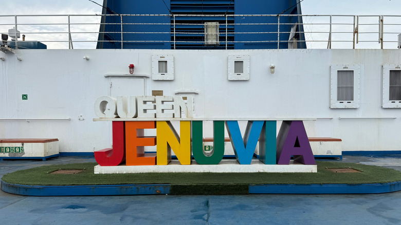 Jeju, South Korea - June 12 2025: Queen Jenuvia Ferry(from Mokpo Port to Jeju Port) sign on the deck.