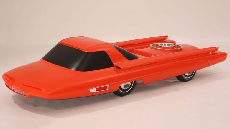 An early scale model of the Ford Nucleon in all red.