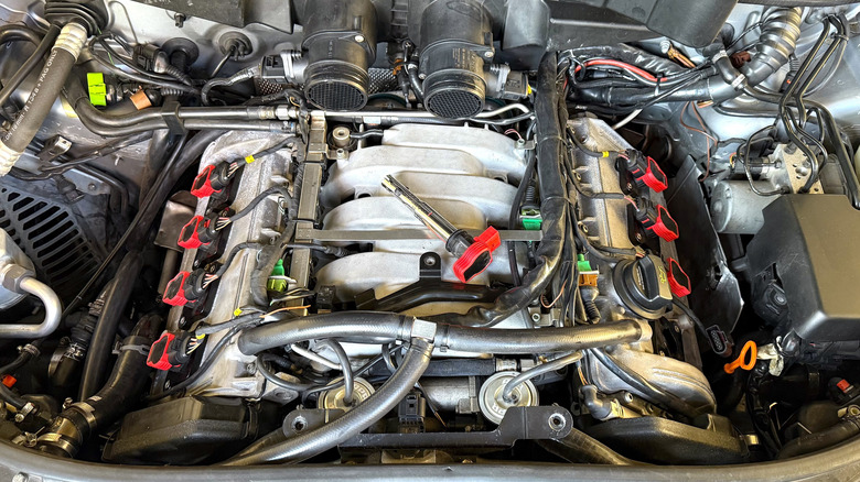 The engine of a C5-generation Audi RS6 while undergoing diagnosis.
