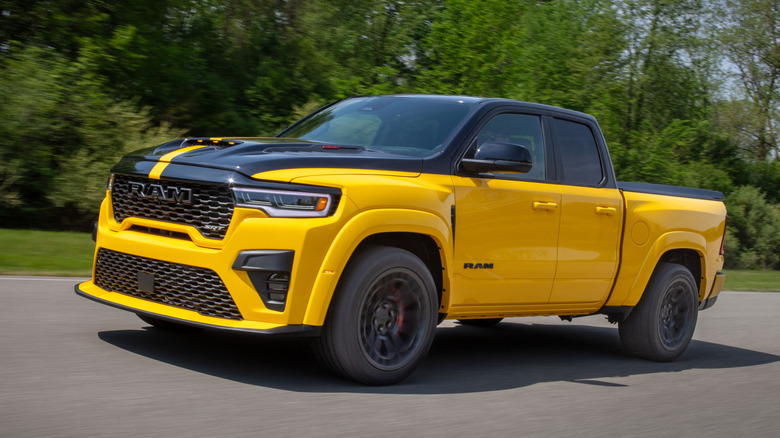 The new 2027 Ram 1500 Rumble Bee driving down the road