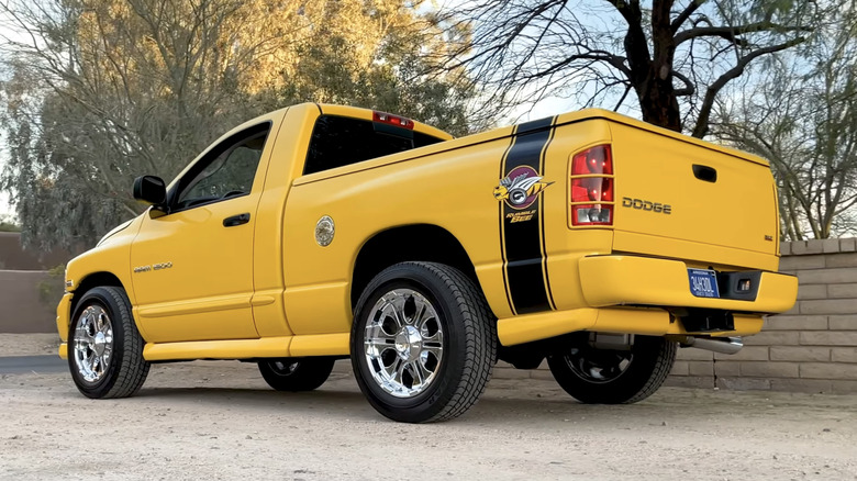 A bright yellow and black Dodge Ram Rumble Bee parked