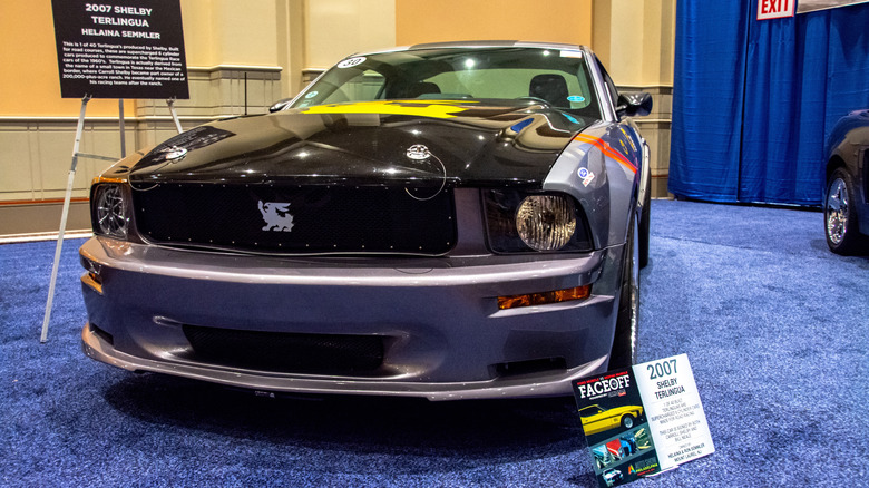 A Shelby Terlingua with signage at a car show